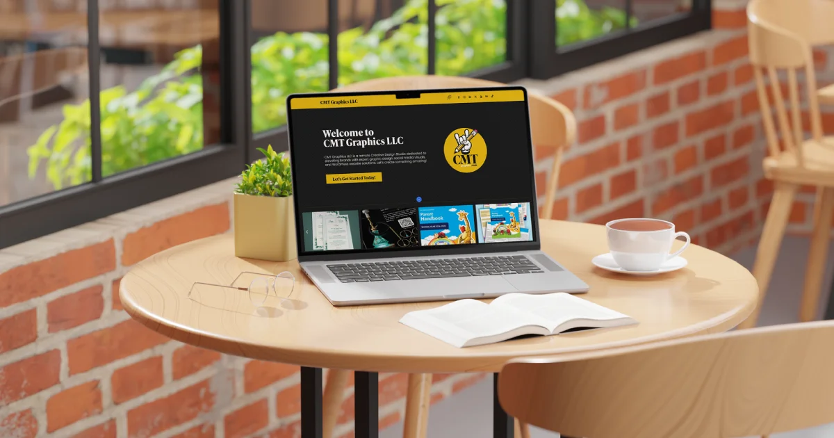 Laptop on a cafe table displaying a Brooklyn Website Redesign.